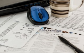 Documents and a blue mouse