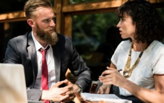 A woman and a man having a discussion