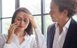 Businesswoman talking on the phone with a difficult client