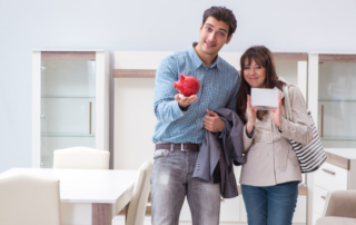 Young couple with a piggy bank