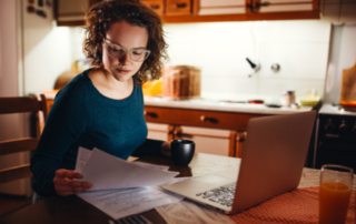 Woman checking bills