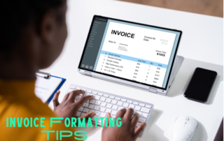 Woman in front of a laptop creating an invoice